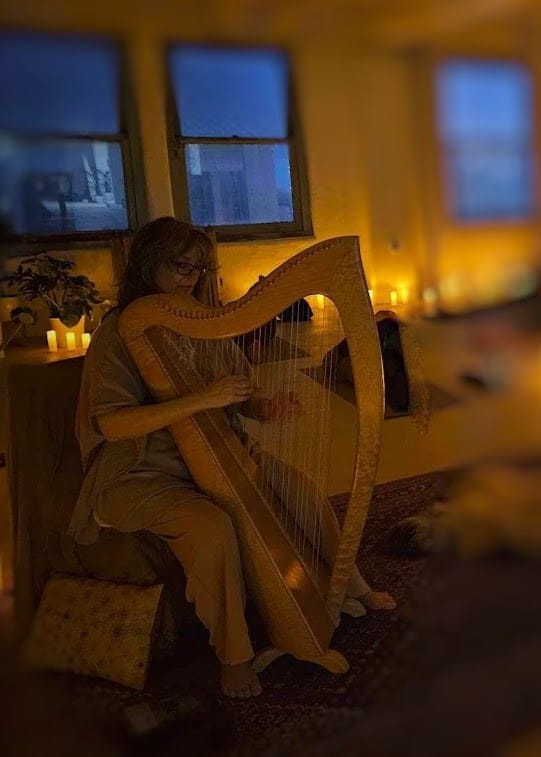 Mary plays Irish Tunes for a harp therapy and yoga solstice gathering